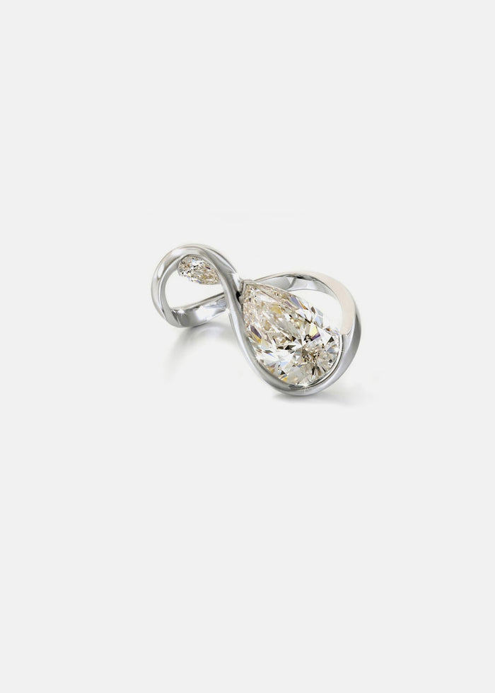 Two pear cut lab grown diamonds in an infinity loop toi et moi engagement ring in white gold
