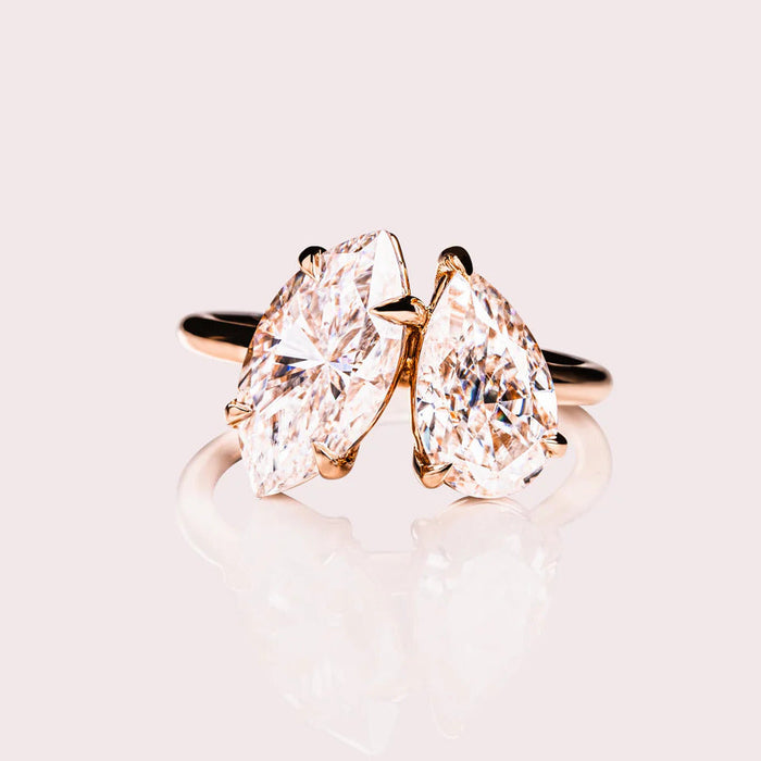 Pear and marquise cut moissanite Toi et Moi engagement ring in gold