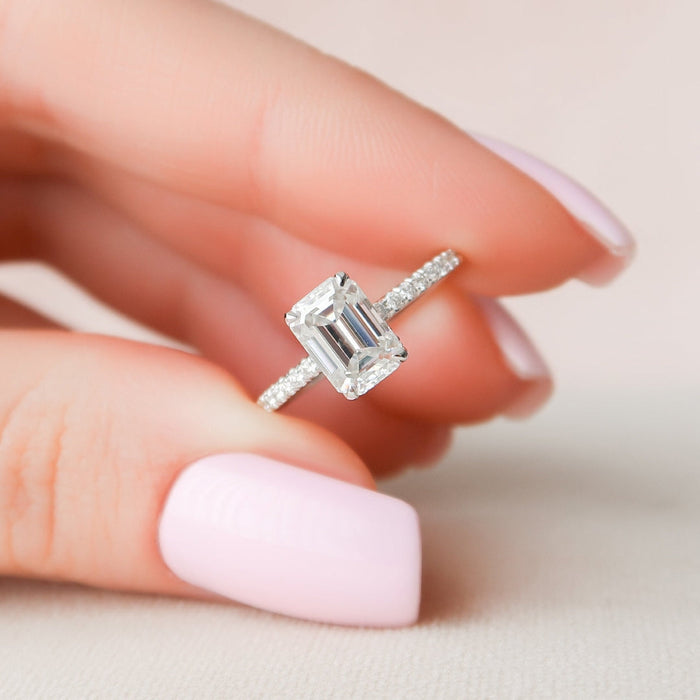 Handmade Art Deco emerald cut moissanite bridal ring, angled view