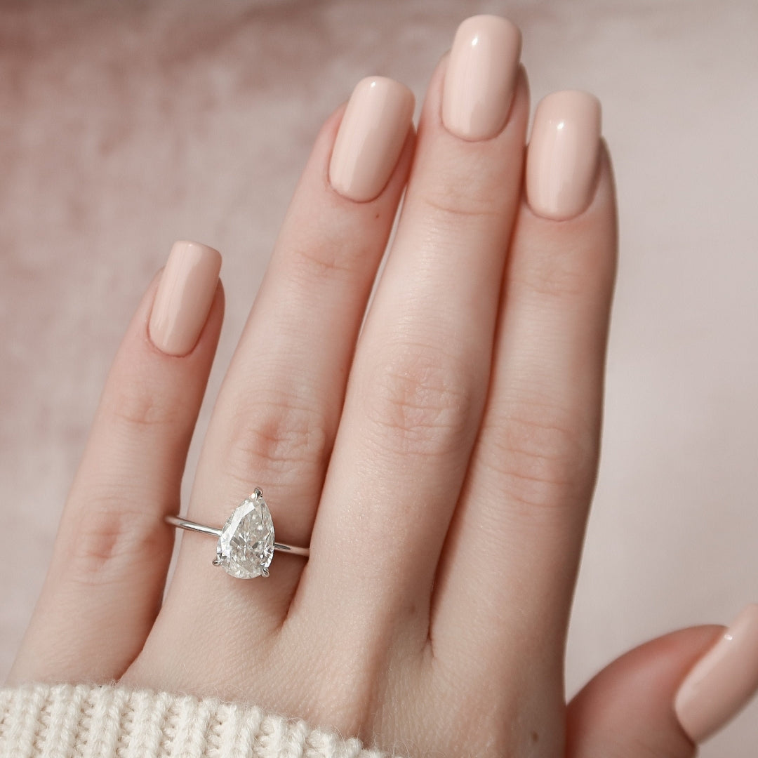Modern Bridal Teardrop Moissanite Ring
