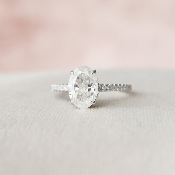Oval moissanite solitaire engagement ring in gold