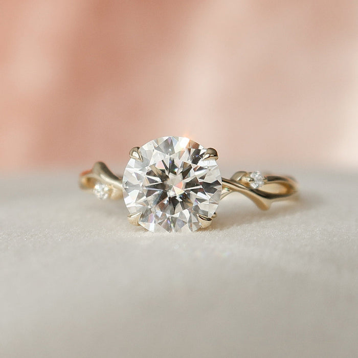 Round cut moissanite eternity wedding band in gold