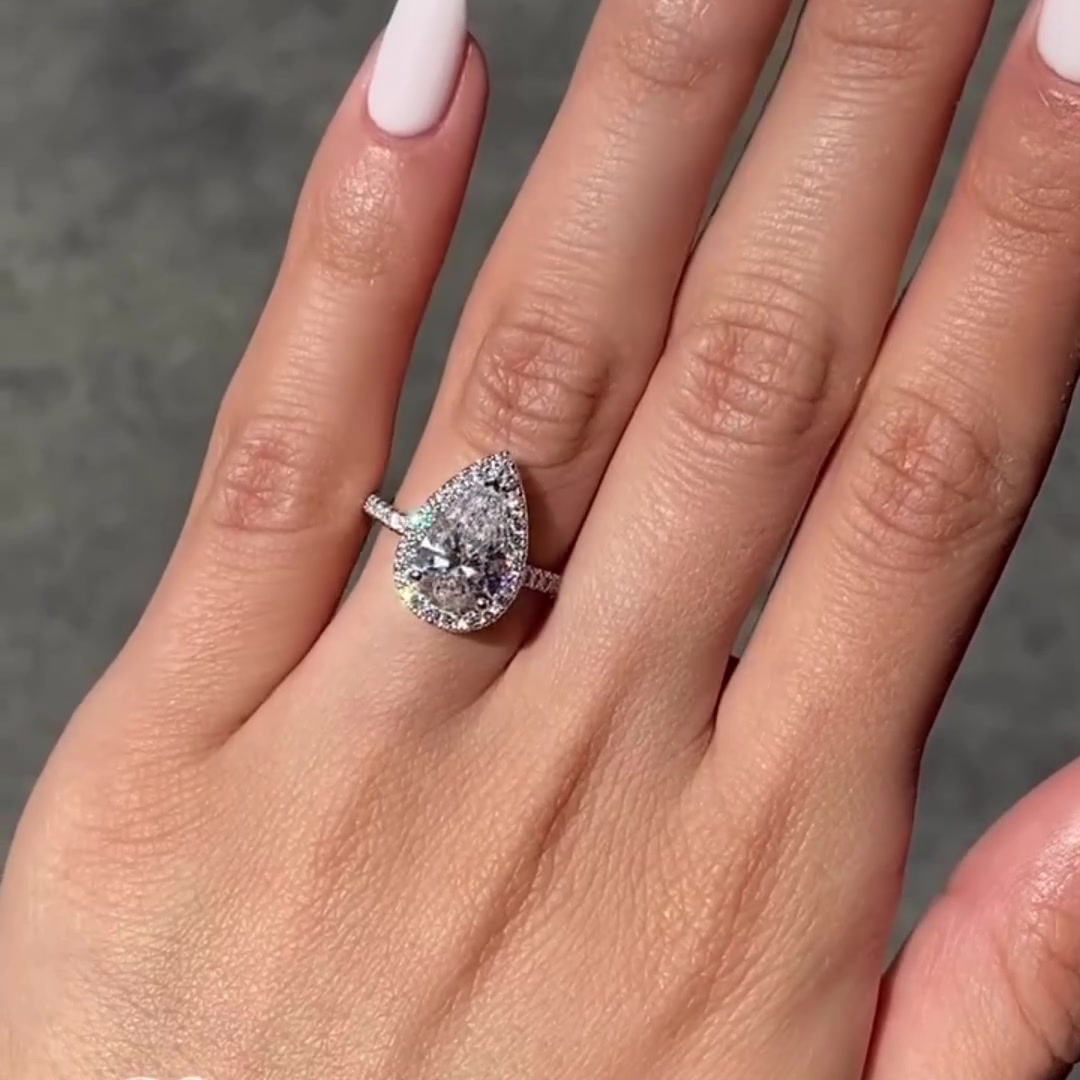 Elegant Pear Shaped Moissanite Anniversary Ring