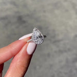 Load image into Gallery viewer, Unique Diamond Halo Pear Moissanite Ring