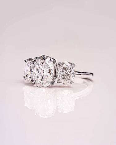 Split shank oval cut moissanite anniversary ring, angled view