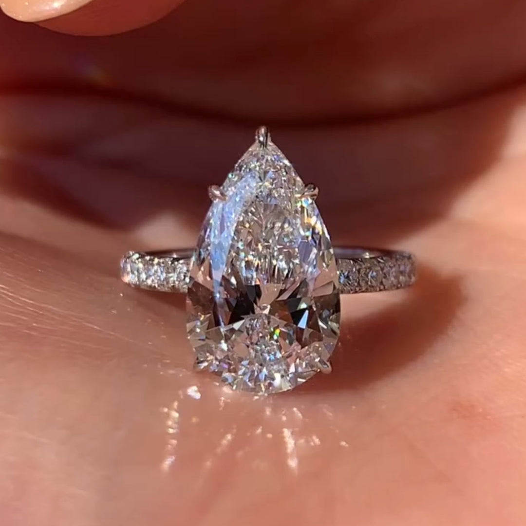Solid Gold Pear Engagement Ring with Hidden Halo