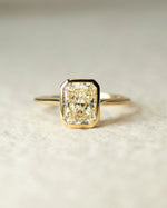 Load image into Gallery viewer, Radiant Cut Moissanite Bezel Set Ring – 14K Yellow Gold Solitaire Engagement Ring