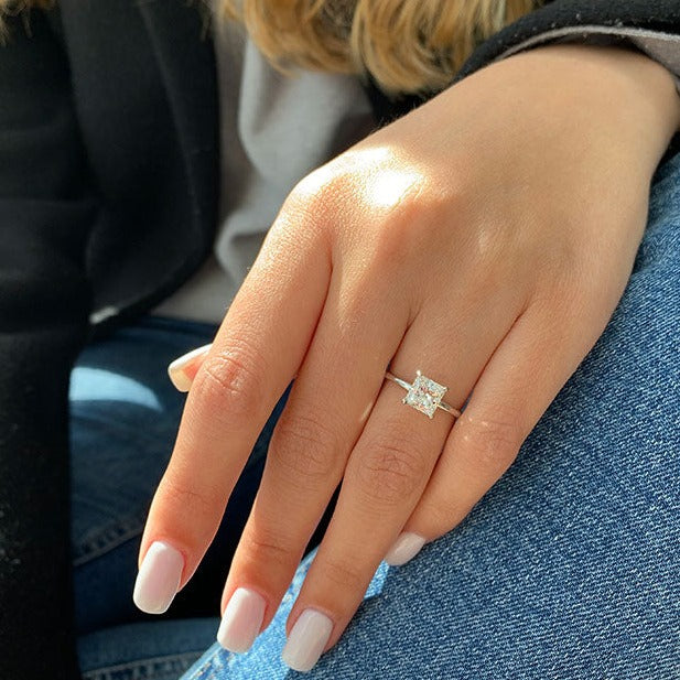 Princess Cut Moissanite Four Prong Solitaire Engagement Ring - on hand view 1