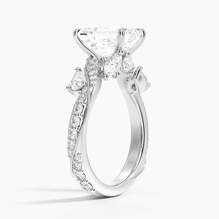 Profile view showing the larger round accent set into the twisting vine