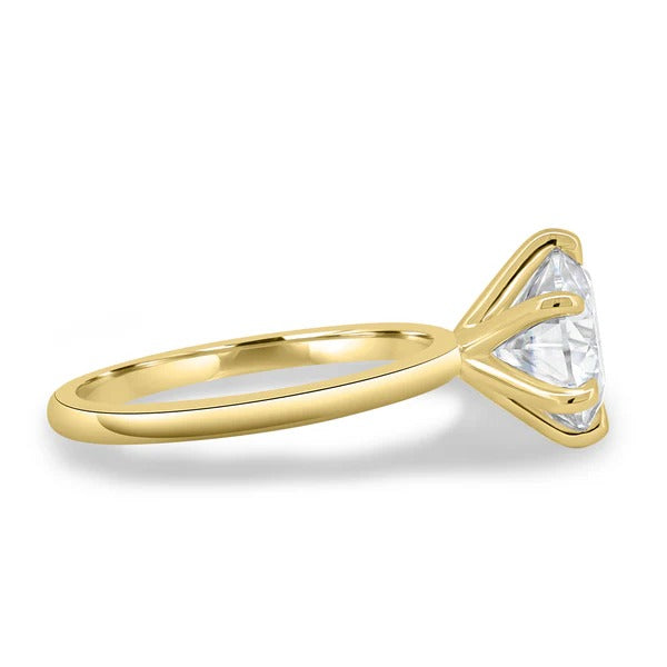 Six claw round solitaire ring side view