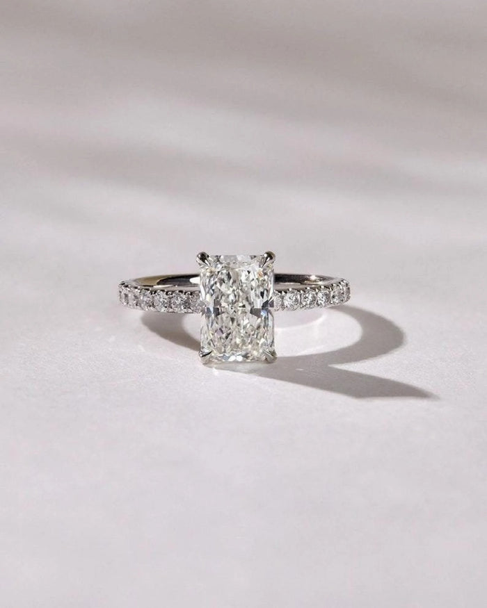 Elongated radiant cut lab grown diamond with pave shoulders