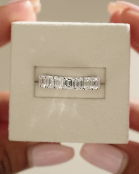 Basket set emerald eternity band side view