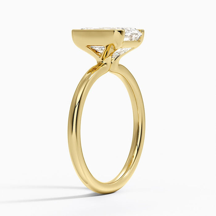 Side profile showing the low half bezel setting and slim plain band
