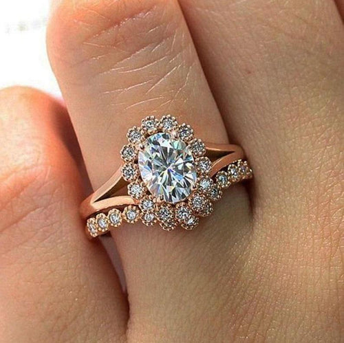 Oval cut lab grown diamond bridal set with split shank and curved band