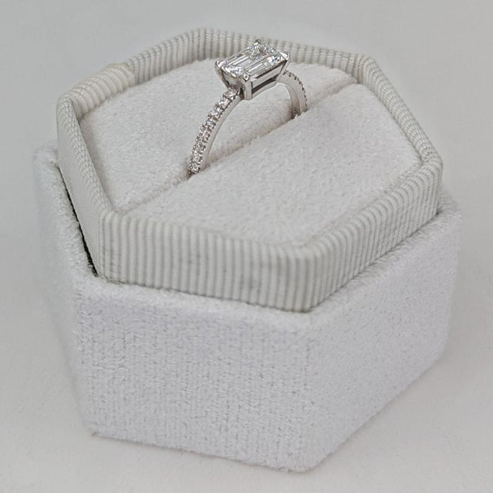 East west emerald cut lab grown diamond ring angled view