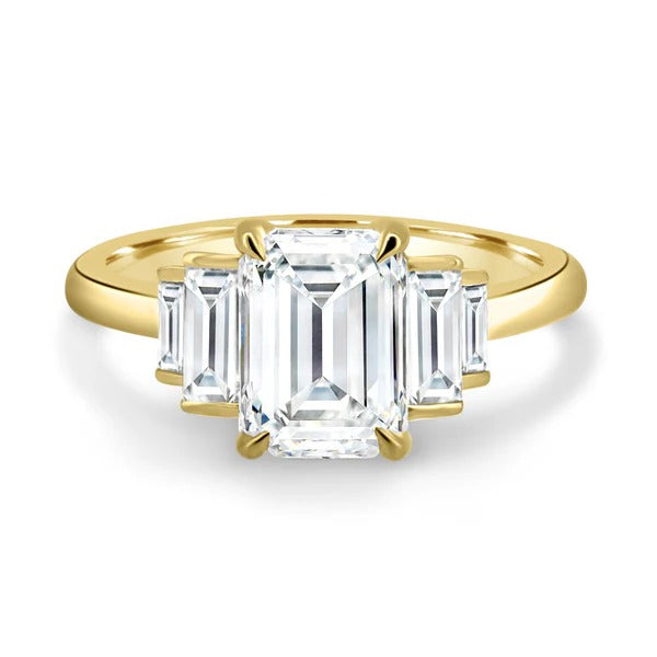 Emerald baguette trilogy ring side view