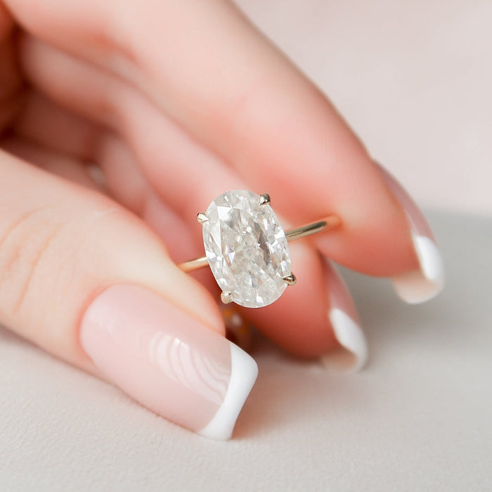 Elongated oval lab grown diamond engagement ring seen from above