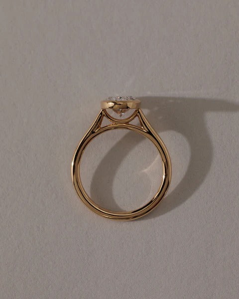 Oval bezel cathedral ring side view