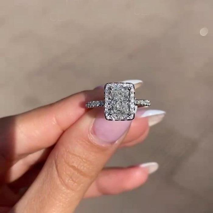 White gold radiant cut lab grown diamond ring angled view