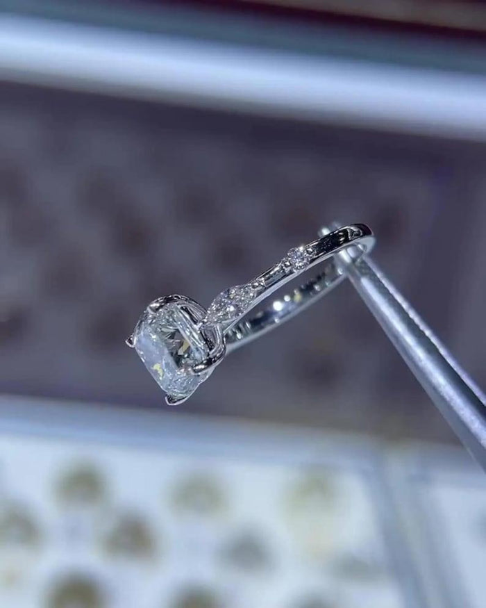 Marquise shaped accents spaced along the shoulders with metal between