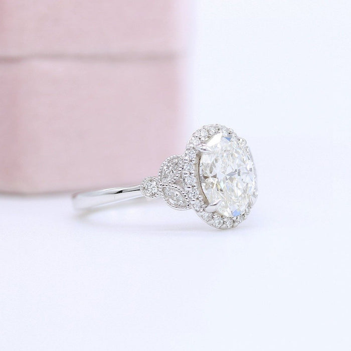 Oval lab grown diamond vintage filigree halo engagement ring