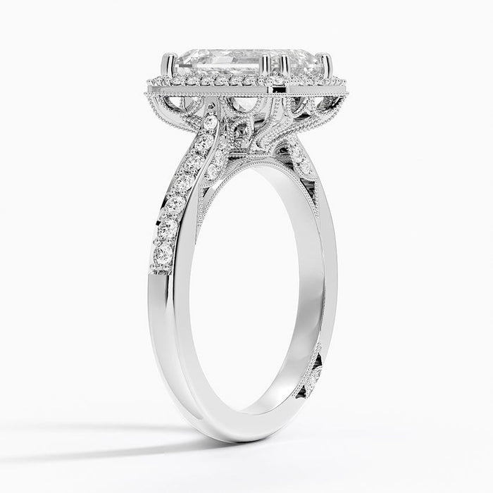 Side profile showing the milgrain edged rectangular halo and graduated pave shoulders