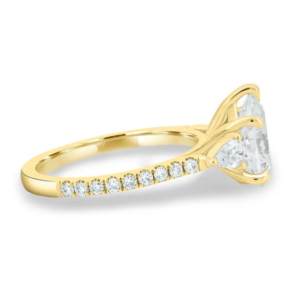 Pear trilogy pave ring detail