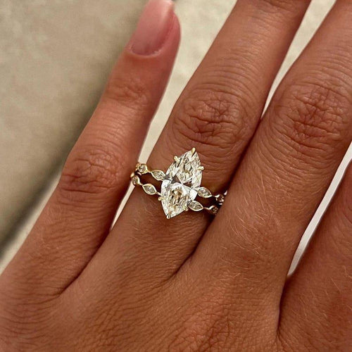 Marquise cut lab grown diamond bridal ring set with marquise accent wedding band