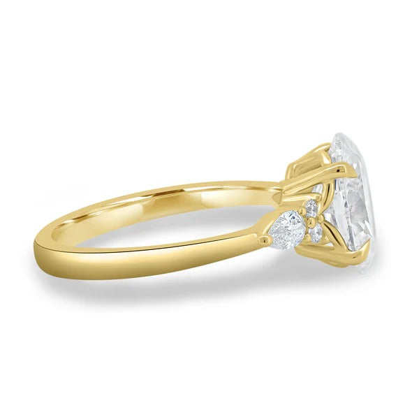 Oval round pear trilogy ring side view