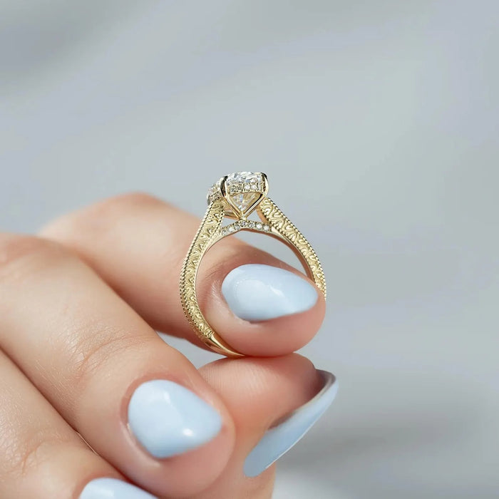 Oval cut lab grown diamond hidden halo ring shown on the hand