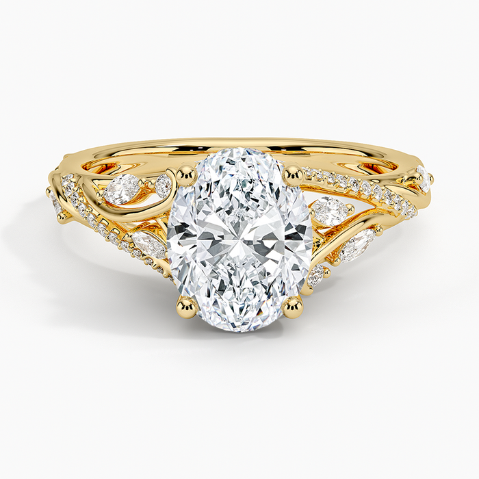 Oval cut lab grown diamond ring with pierced scroll shoulders and marquise leaves in yellow gold, top view
