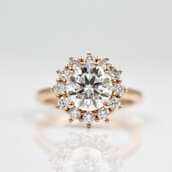 Round lab grown diamond sunburst cluster halo engagement ring