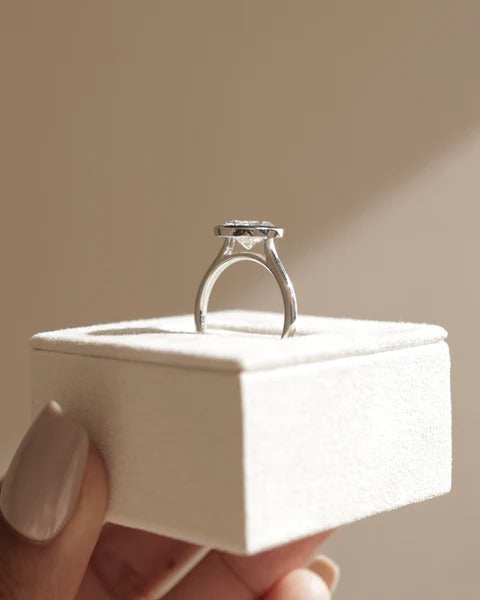 Oval bezel cathedral ring side view