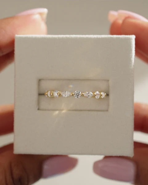 Round and marquise cut diamond wedding ring