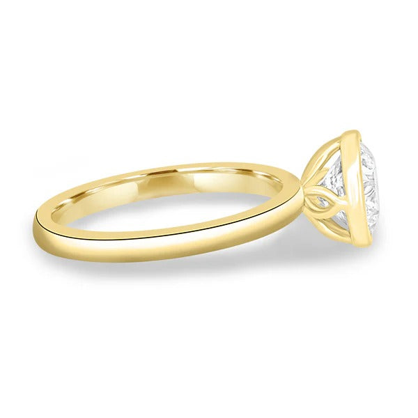 Bezel round solitaire ring side view