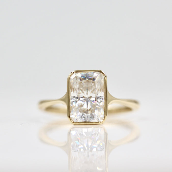 Radiant cut lab grown diamond bezel solitaire engagement ring