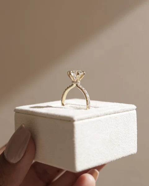 Round pave hidden halo ring side view