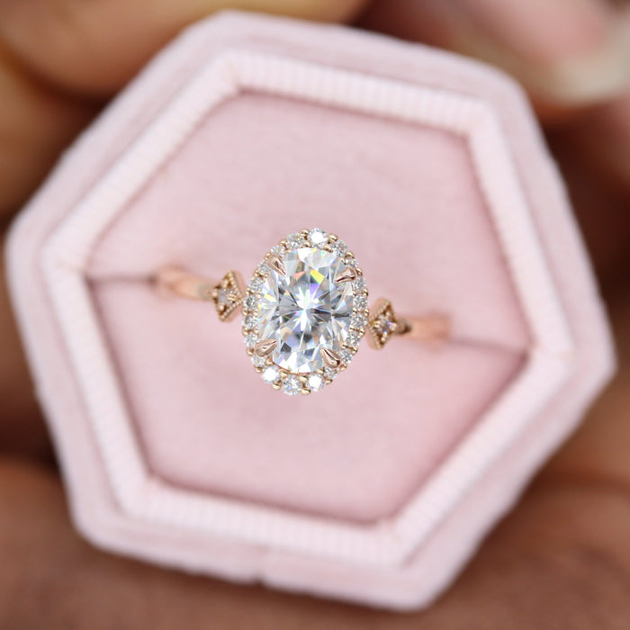 Oval lab grown diamond vintage halo ring with bullet cut accents