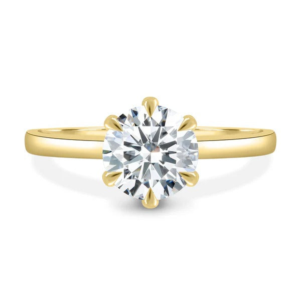 Low profile round solitaire ring side view