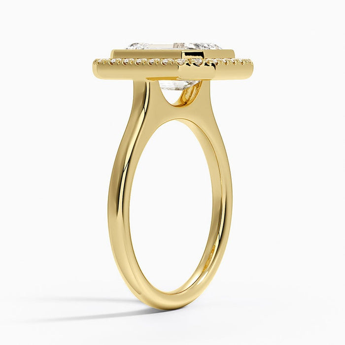 Profile view showing the low bezel set head, halo frame and plain polished band
