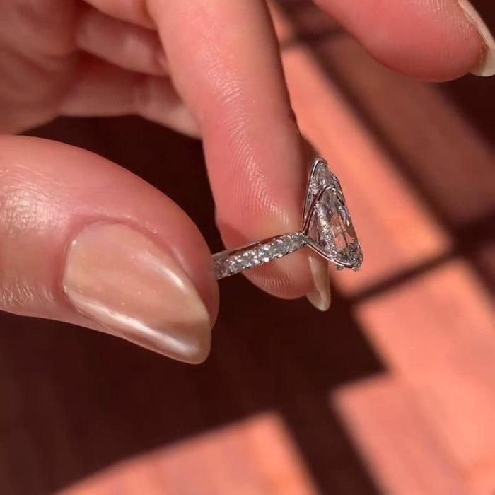 Tear drop lab grown diamond engagement ring angled view