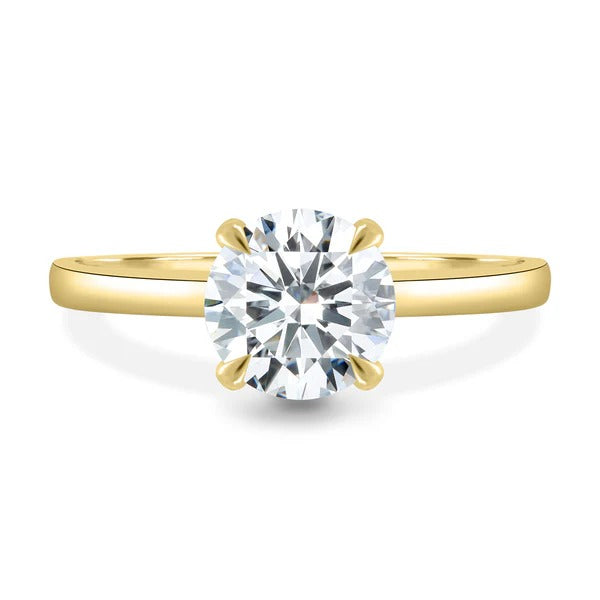 Four claw round solitaire ring side view