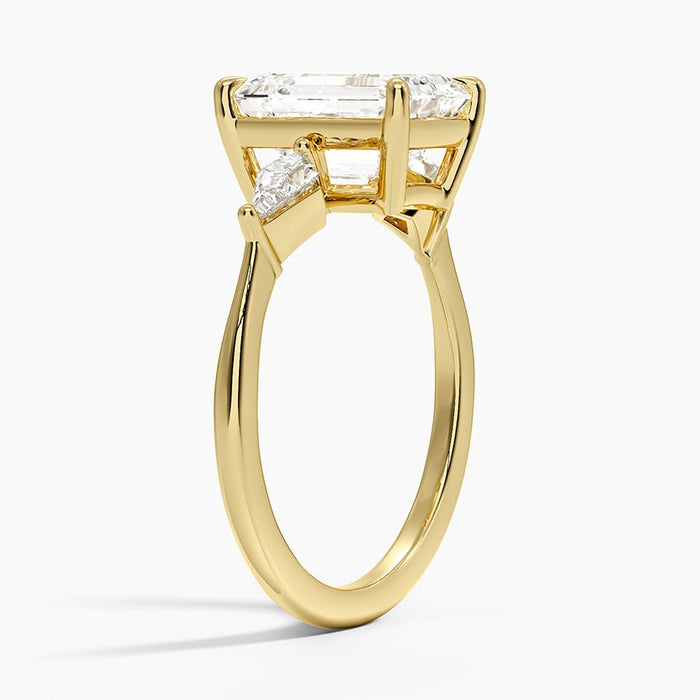 Profile view showing the trillion side stones set level with the center diamond