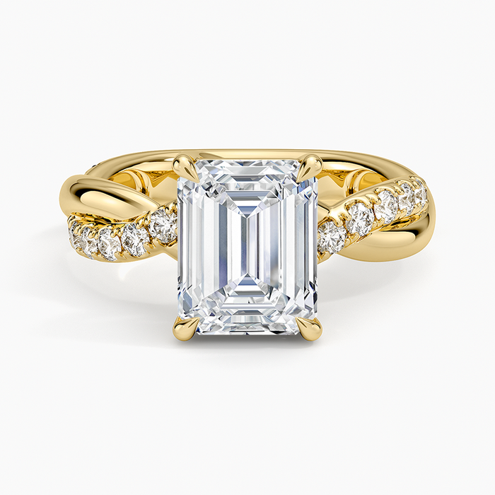 Emerald cut lab grown diamond ring on a bold twisted rope diamond band in yellow gold, top view
