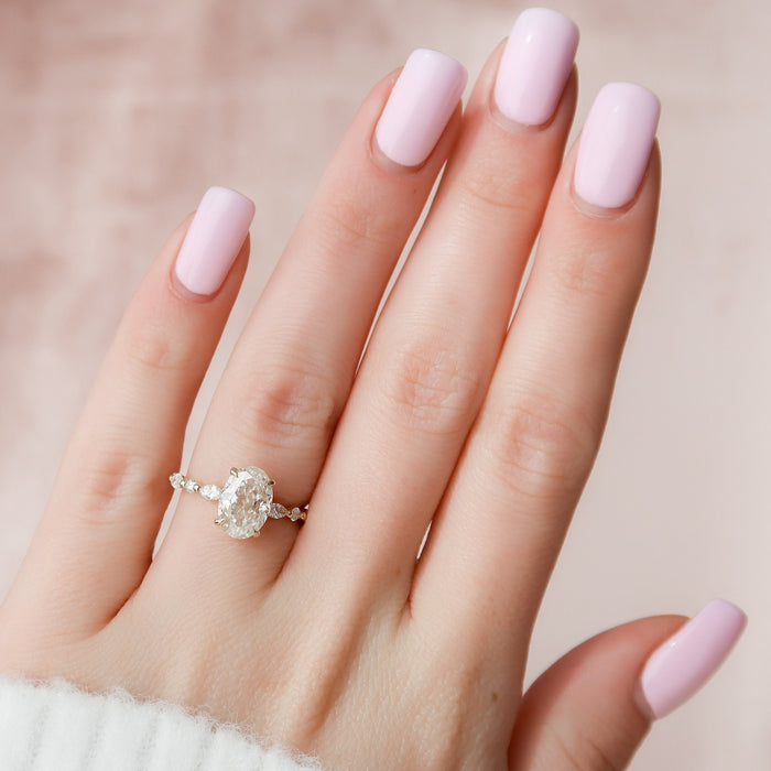 Oval moissanite engagement ring, front view