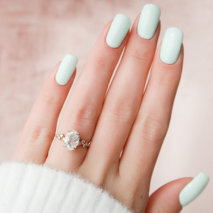 Oval moissanite cluster ring, front view