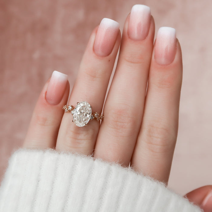 Oval moissanite cluster ring, front view