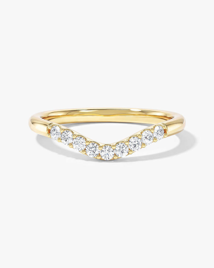 U-curved round moissanite wedding band in yellow gold