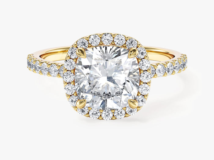 Cushion lab grown diamond halo engagement ring with pave band in yellow gold, front view