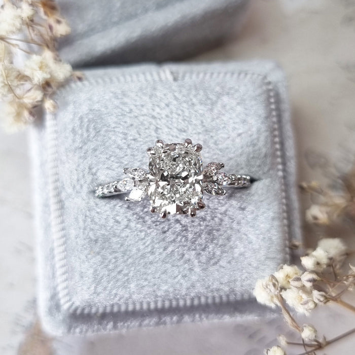 Elongated cushion cut moissanite marquise petal cluster engagement ring in white gold